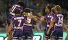 Melbourne-Storm-players-celebrate.jpeg